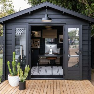 Marks Home Office and Graphic Designer business in a Cabin from She Sheds