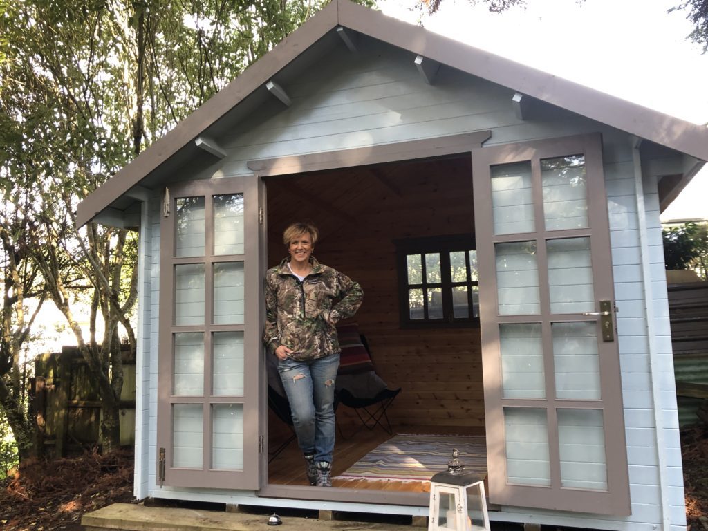 Hillary Barry standing in her She Shed NZ