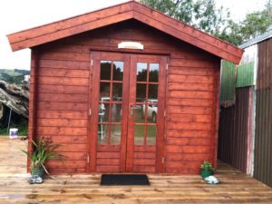 Timber shed for storing motorbikes and leisure toys