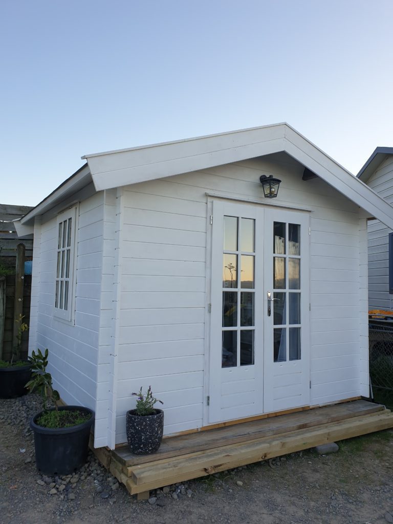 White timber cabin as a granny flat