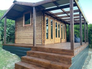 The Ranch Cabin with a veranda and custom deck in Marlborough Sounds