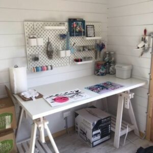 Working from home in her sewing studio which is a kitset studio